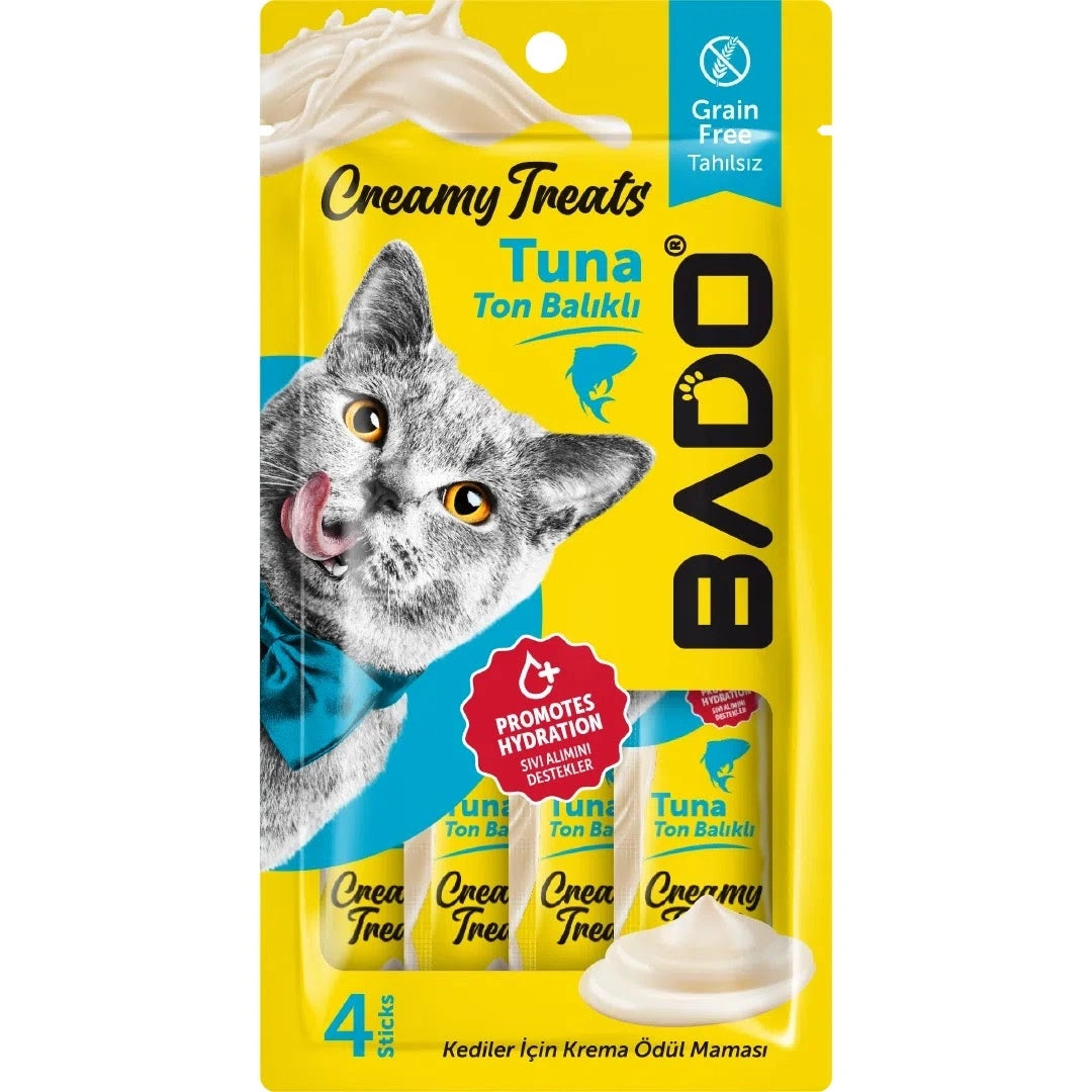 Set de 4 plicuri a câte 15g cu gustare cremoasă Bado pentru pisici, snack premium fără cereale cu ton pentru hidratare și blană sănătoasă.